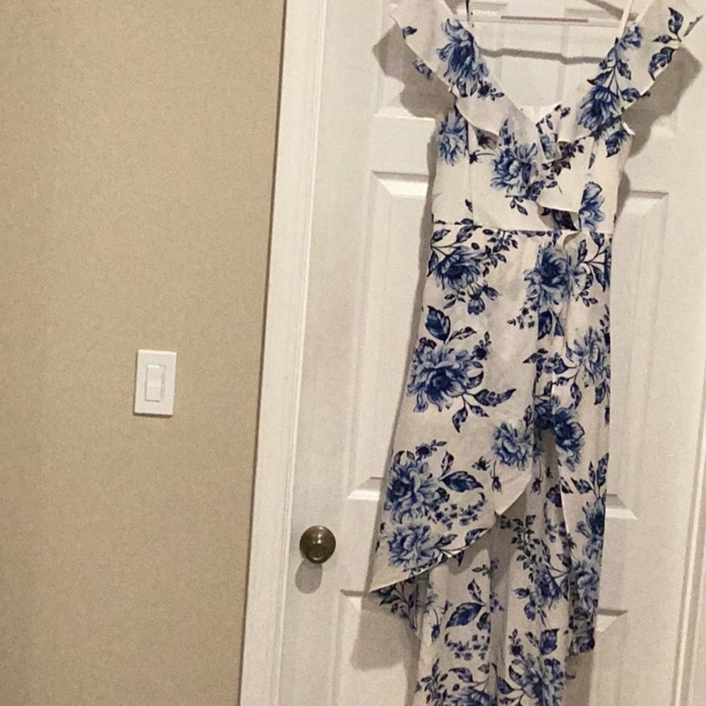Women’s Blue Floral High Low Romper with wrap skirt over it